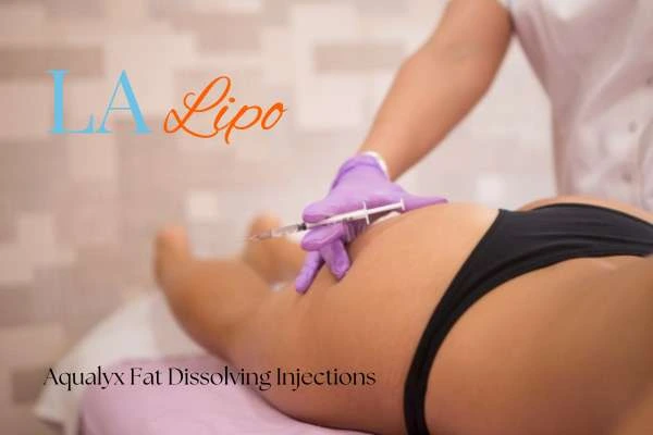 Woman having fat dissolving injections Marlow on thighs